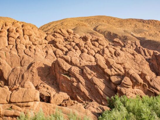 Rounded red rock formations known as the Monkey Fingers in the Dades Valley