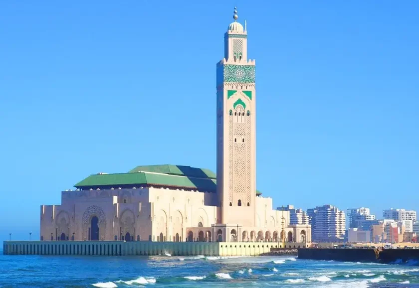 The Hassan II Mosque and its minaret on the Casablanca seafront, with the city behind