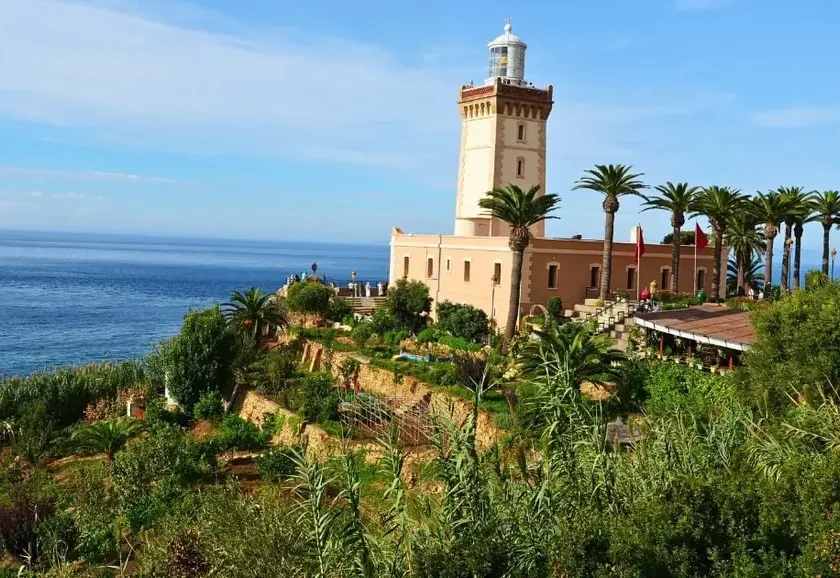 The Cap Spartel lighthouse above the Atlantic near Tangier, surrounded by palms